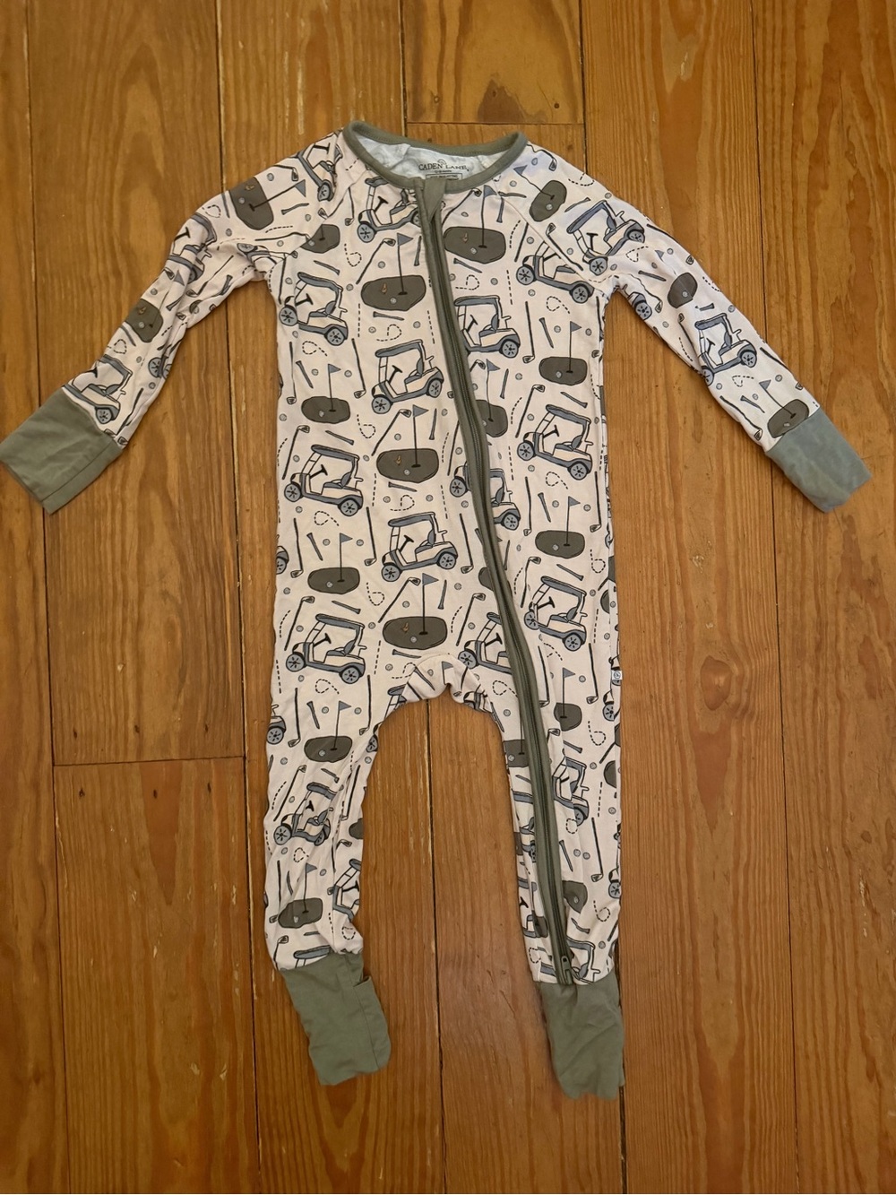 Caden Lane White Footie Pajamas with Green Golf Cart Print